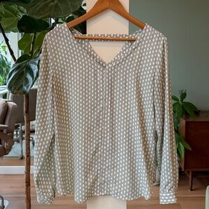 White and green patterned blouse